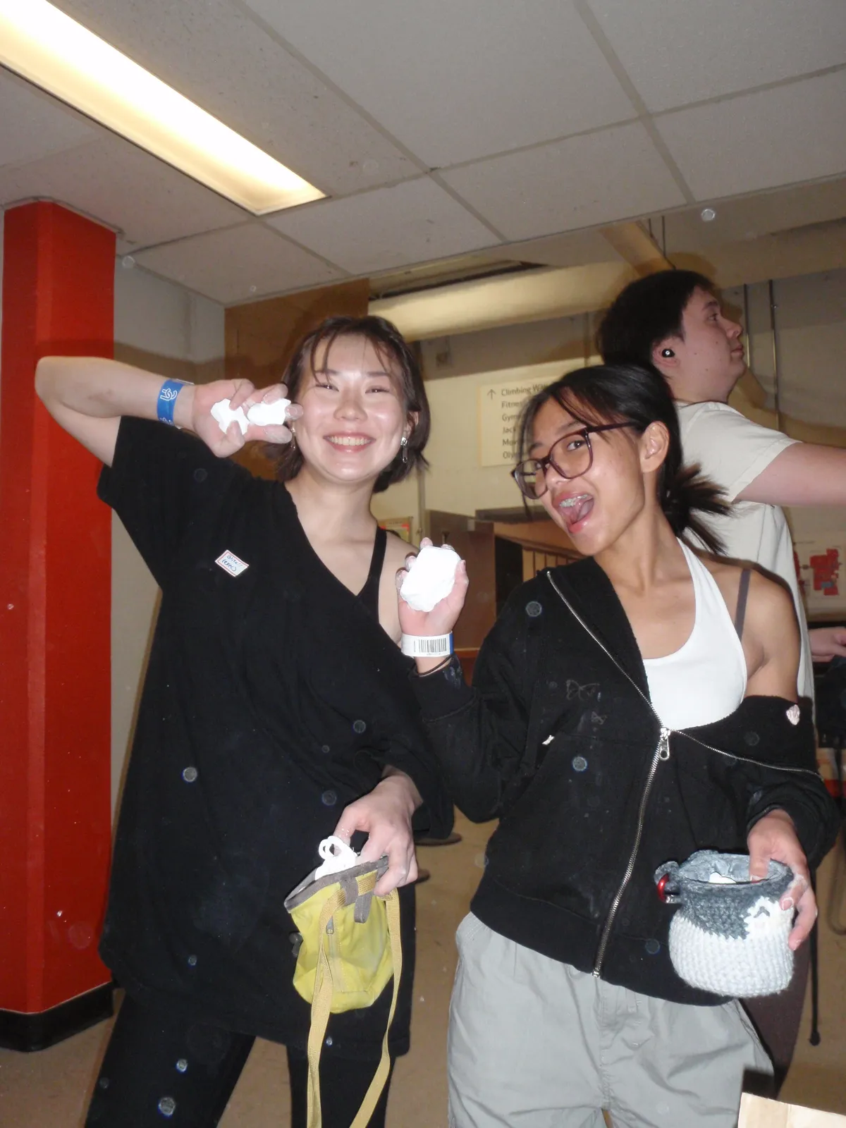 Chalking up at the basement wall.